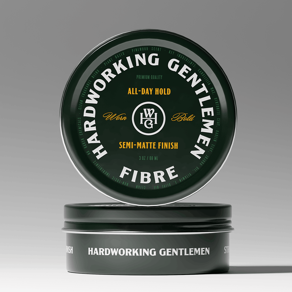 Hardworking Gentlemen clay product packaging on a gray background