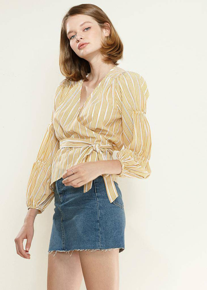 Smocked Sleeve Stripe Wrap Blouse in Yellow by Shop at Konus