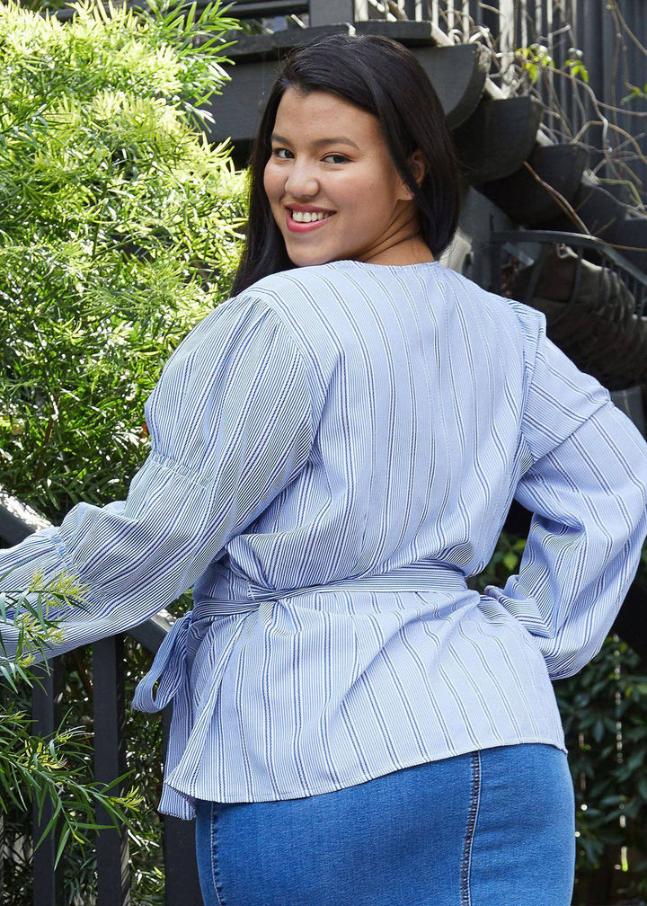 Plus Size Stripe Wrap Blouse in Blue by Shop at Konus