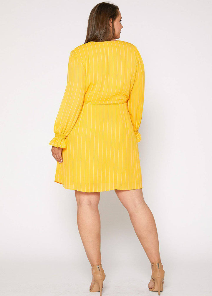 Plus Size Smocked Bell Sleeve Wrap Dress in Yellow by Shop at Konus