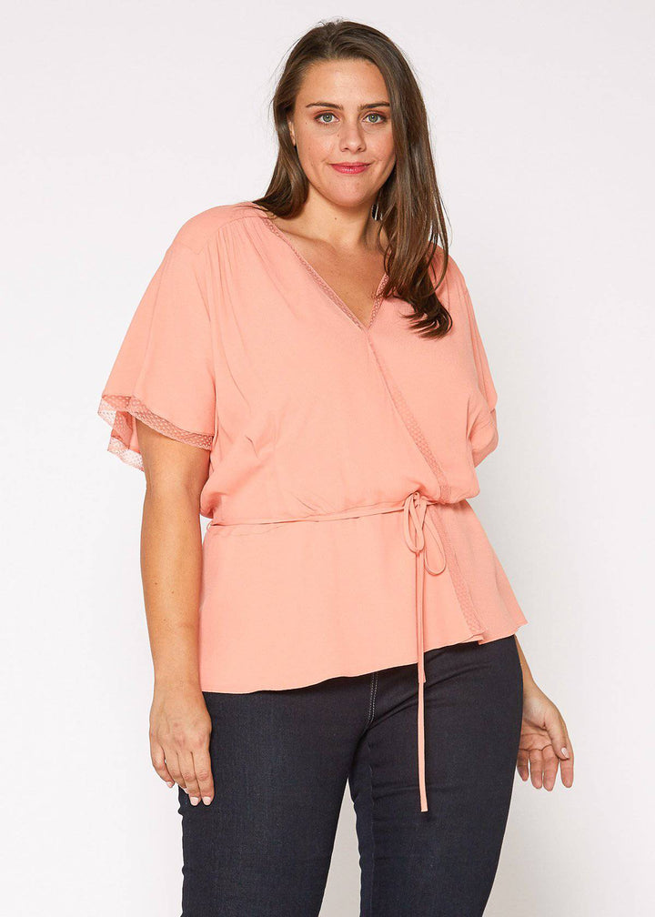 Plus Size Lace Trim Cape Sleeve Wrap Blouse in Coral by Shop at Konus