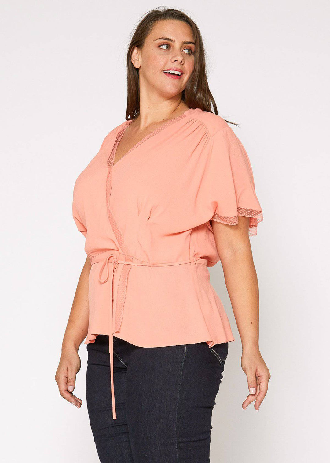 Plus Size Lace Trim Cape Sleeve Wrap Blouse in Coral by Shop at Konus