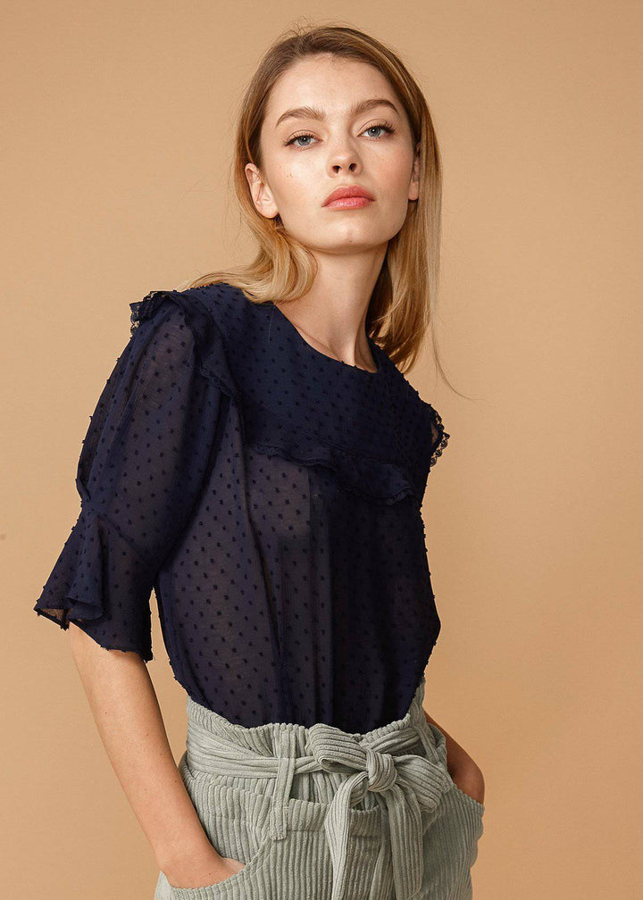 Women's Swiss Dot Ruffle Sleeve Top in Midnight by Shop at Konus