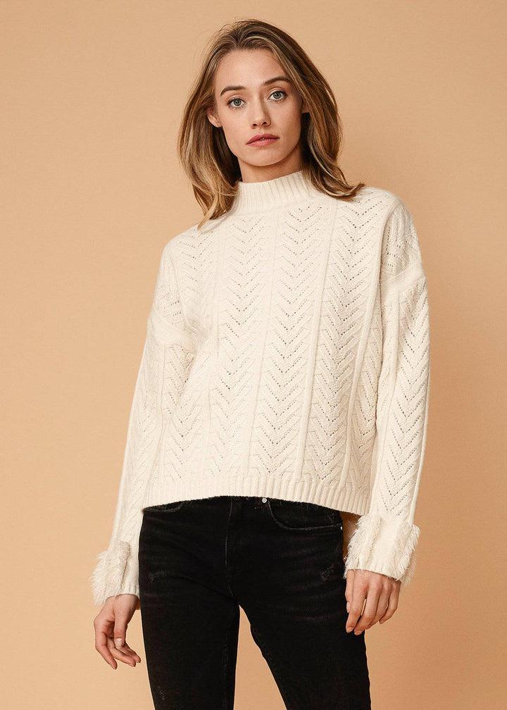 Women's Turtle Neck Fringe Sweater in Natural by Shop at Konus